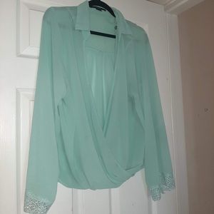 Lace trim mint cross front top